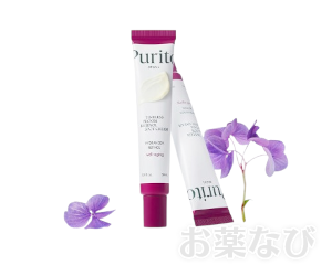 タイムレスブルームレチノールスポットクリーム（PURITO）のチューブ2本と花を組み合わせた商品イメージ画像。シンプルで上品なデザインが特徴